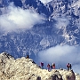 Climbers high on the first ridge of the Dibona via ferrata, Cristallo.